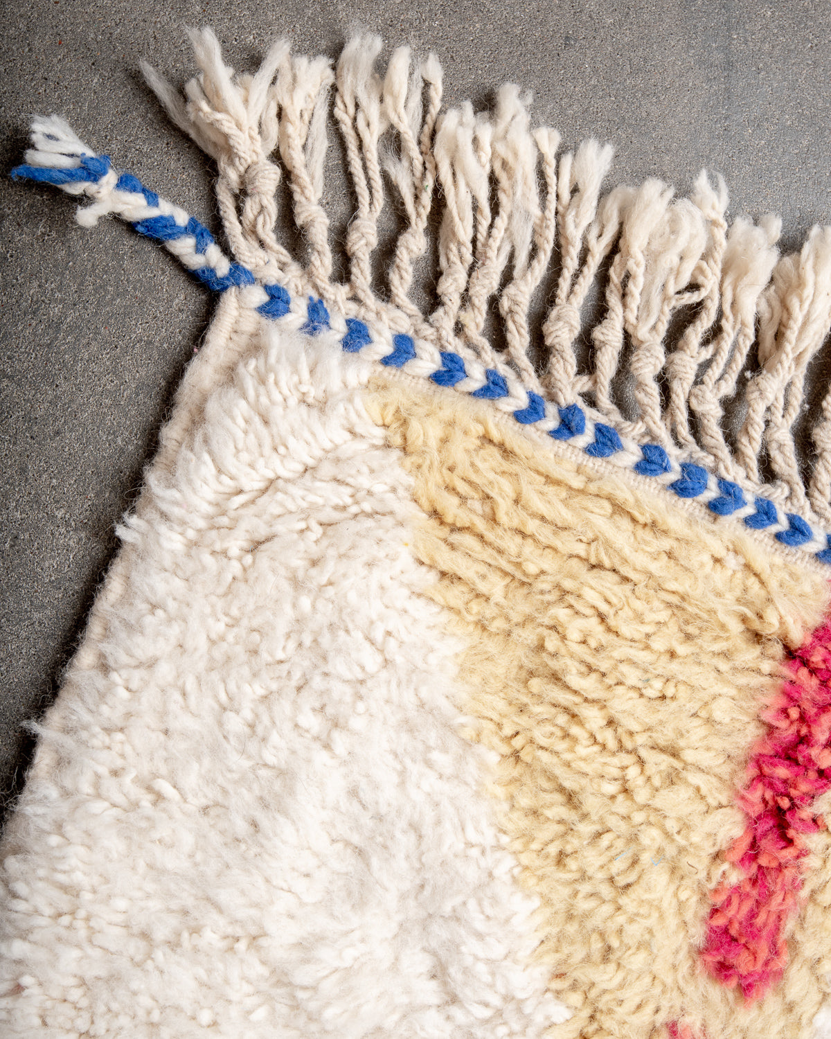 Modern, designer, handcrafted Berber rug from Morocco. Beniourain carpet with beautiful colours and patterns and fluffy wool texture.