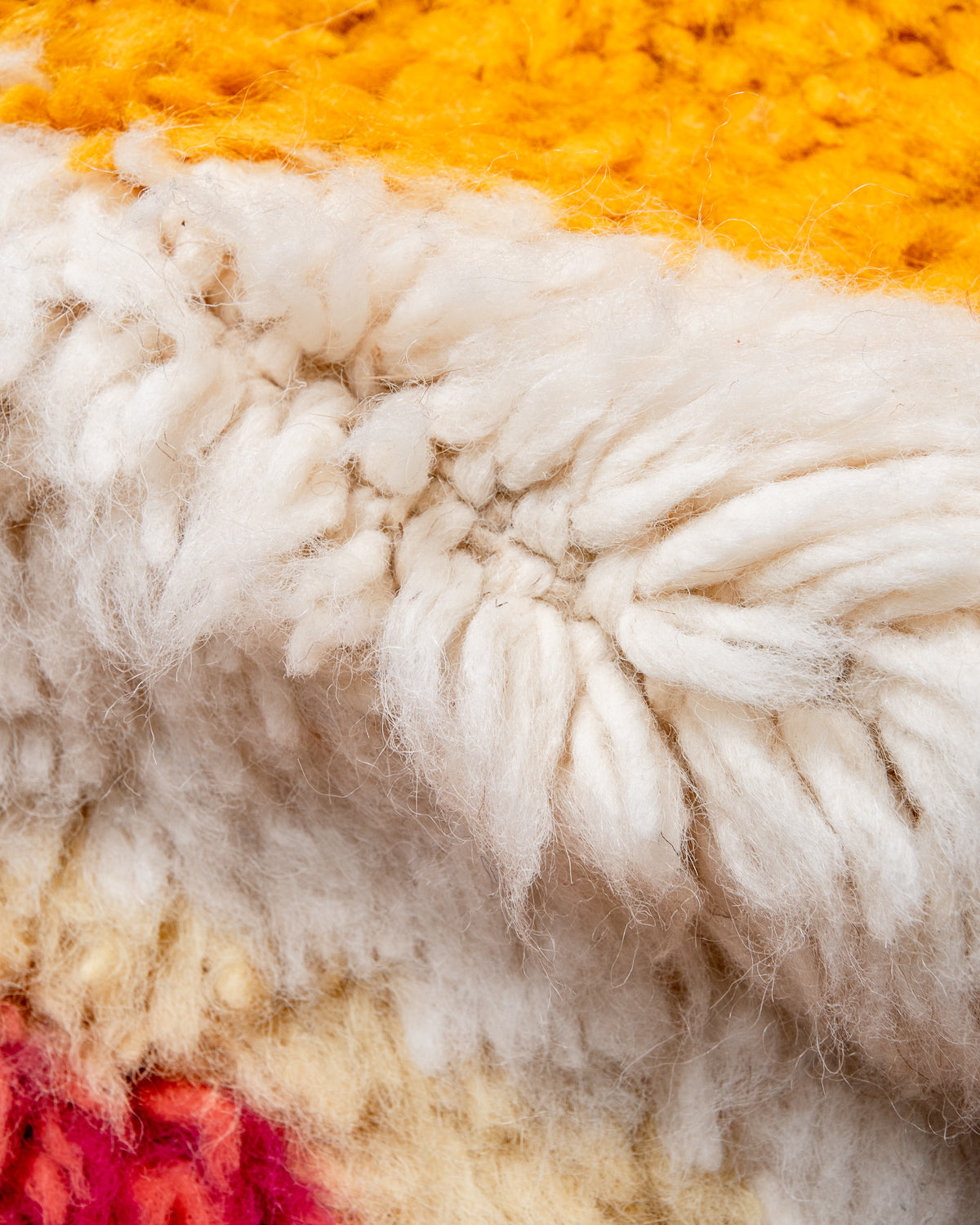 Modern, designer, handcrafted Berber rug from Morocco. Beniourain carpet with beautiful colours and patterns and fluffy wool texture.