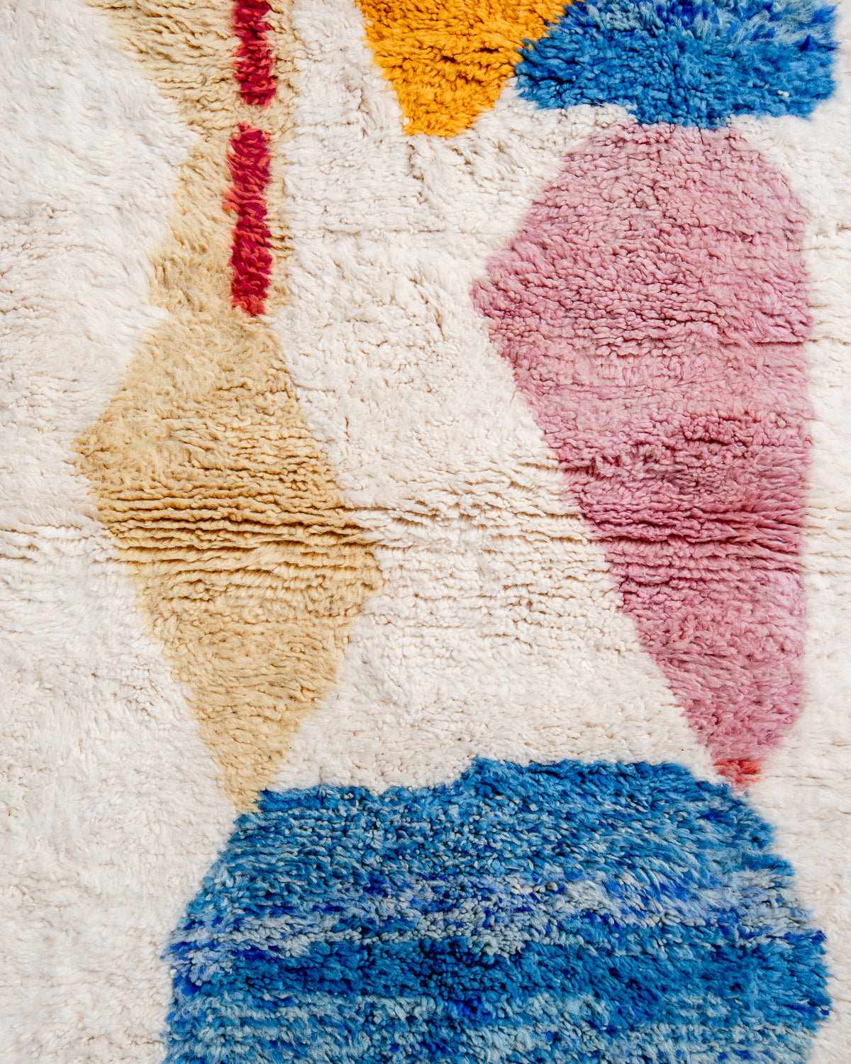 Modern, designer, handcrafted Berber rug from Morocco. Beniourain carpet with beautiful colours and patterns and fluffy wool texture.