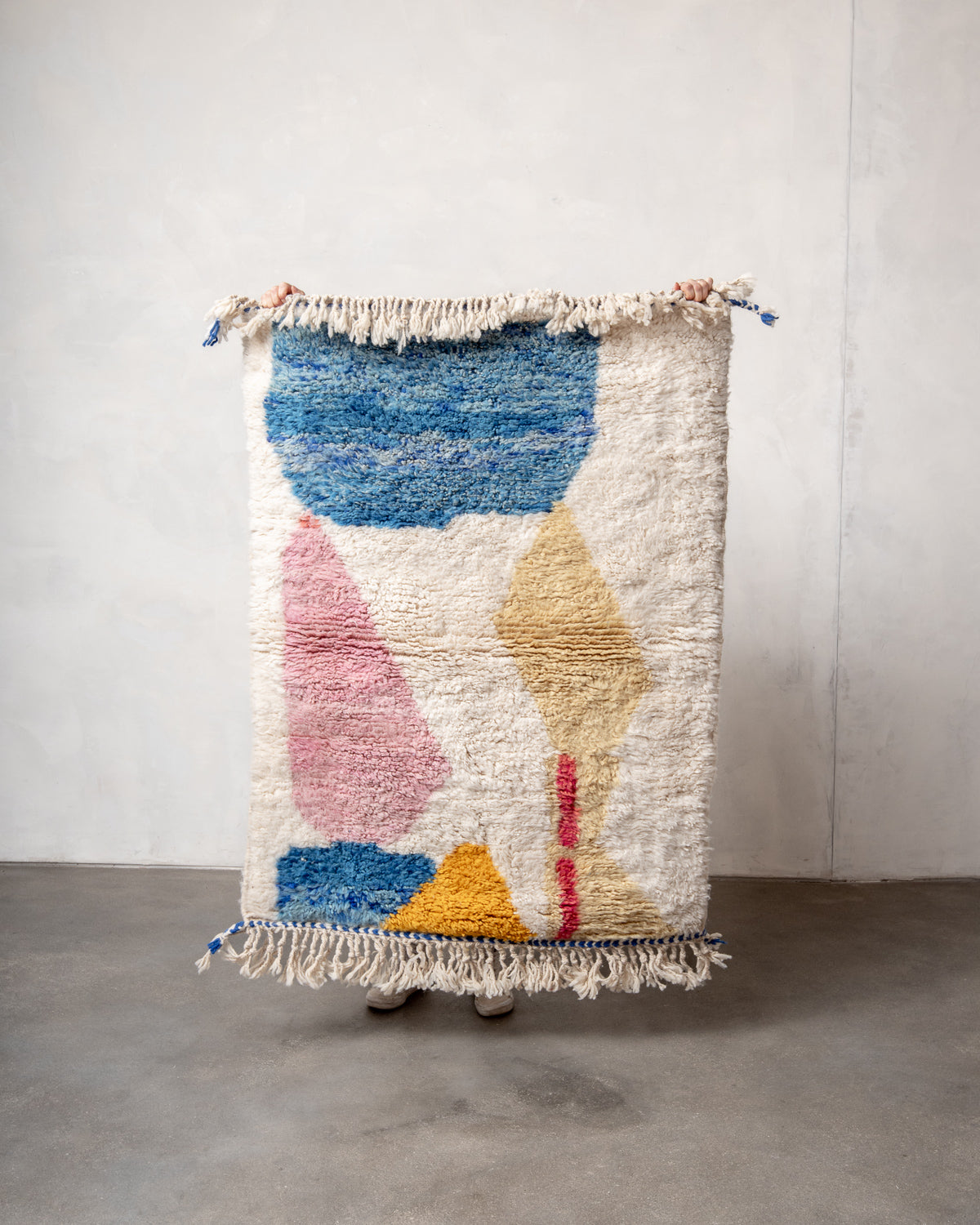 Modern, designer, handcrafted Berber rug from Morocco. Beniourain carpet with beautiful colours and patterns and fluffy wool texture.