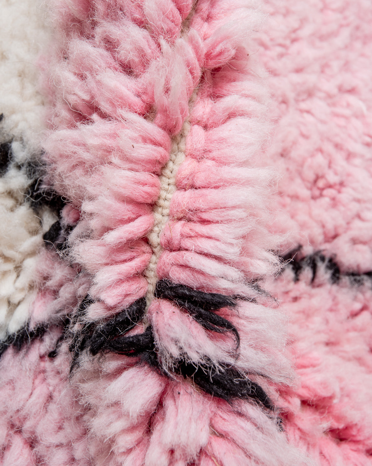 Modern, designer, handcrafted Berber rug from Morocco. Beniourain carpet with beautiful colours and patterns and fluffy wool texture.