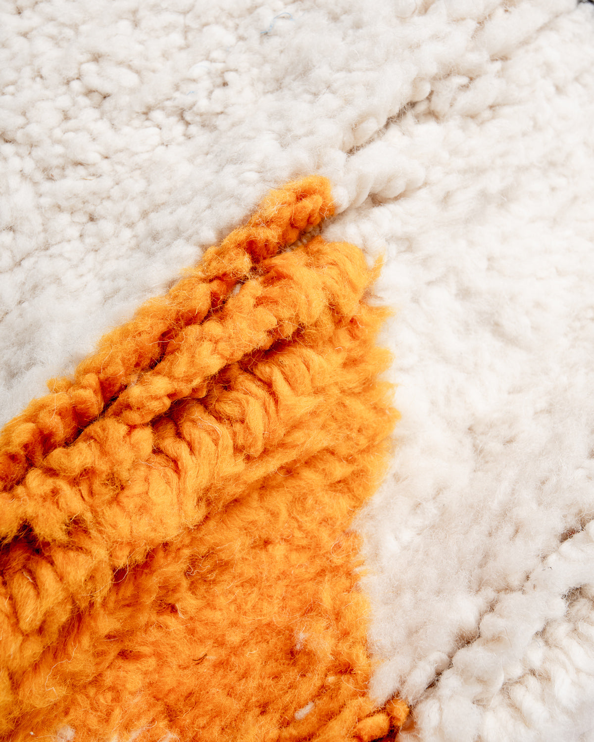 Modern, designer, handcrafted Berber rug from Morocco. Beniourain carpet with beautiful colours and patterns and fluffy wool texture.