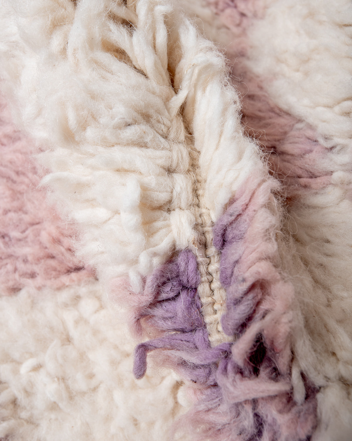 Modern, designer, handcrafted Berber rug from Morocco. Beniourain carpet with beautiful colours and patterns and fluffy wool texture.