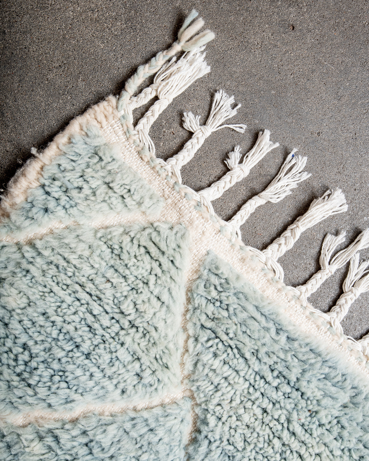 Modern, designer, handcrafted Berber rug from Morocco. Beniourain carpet with beautiful colours and patterns and fluffy wool texture.