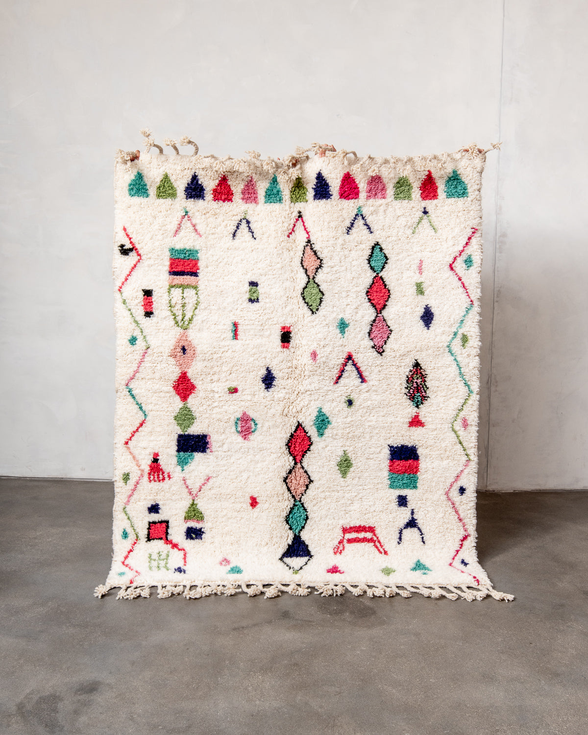 Modern, designer, handcrafted Berber rug from Morocco. Beniourain carpet with beautiful colours and patterns and fluffy wool texture.