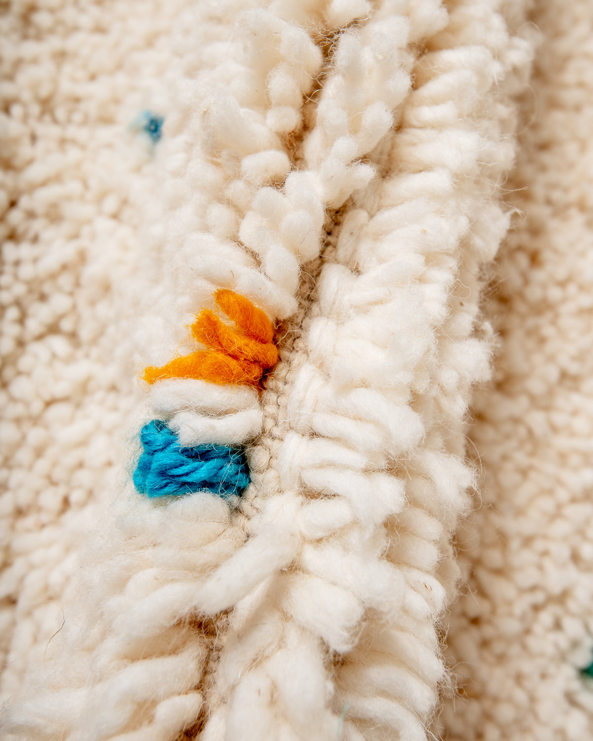 Modern, designer, handcrafted Berber rug from Morocco. Beniourain carpet with beautiful colours and patterns and fluffy wool texture.