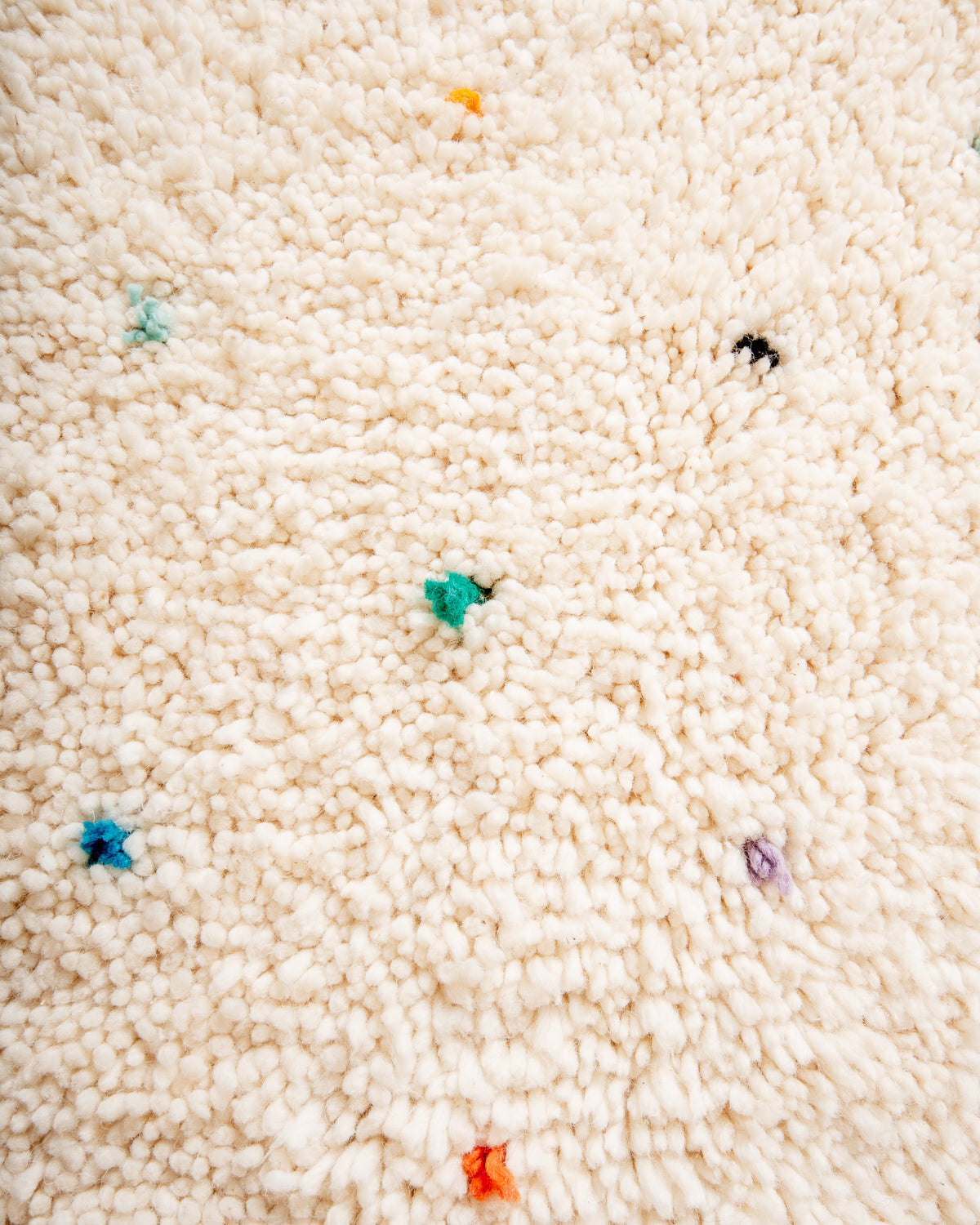 Modern, designer, handcrafted Berber rug from Morocco. Beniourain carpet with beautiful colours and patterns and fluffy wool texture.