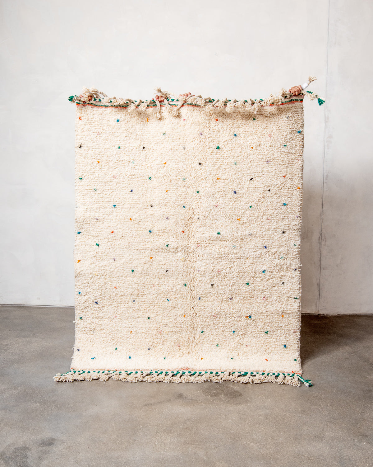 Modern, designer, handcrafted Berber rug from Morocco. Beniourain carpet with beautiful colours and patterns and fluffy wool texture.