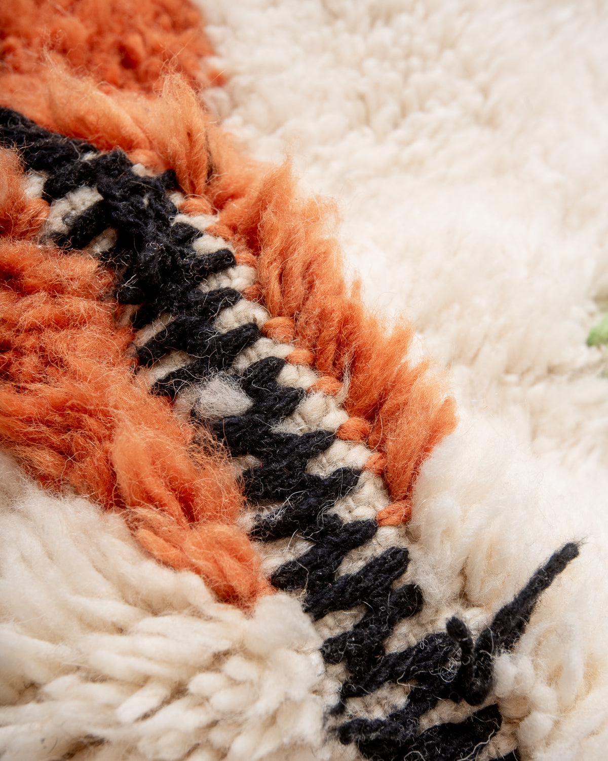 Modern, designer, handcrafted Berber rug from Morocco. Beniourain carpet with beautiful colours and patterns and fluffy wool texture.