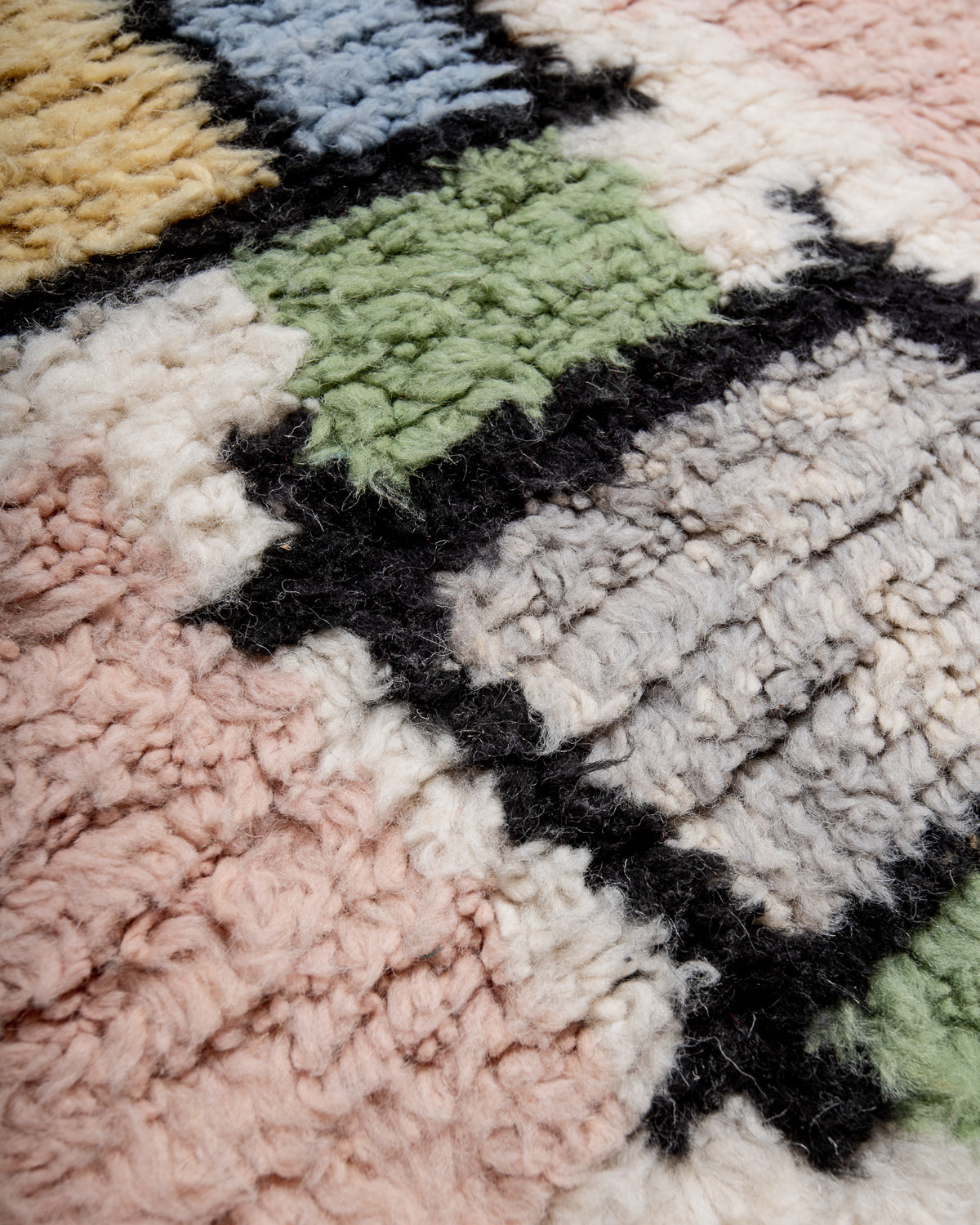 Modern, designer, handcrafted Berber runner rug from Morocco. Beniourain carpet with beautiful colours and patterns and fluffy wool texture.