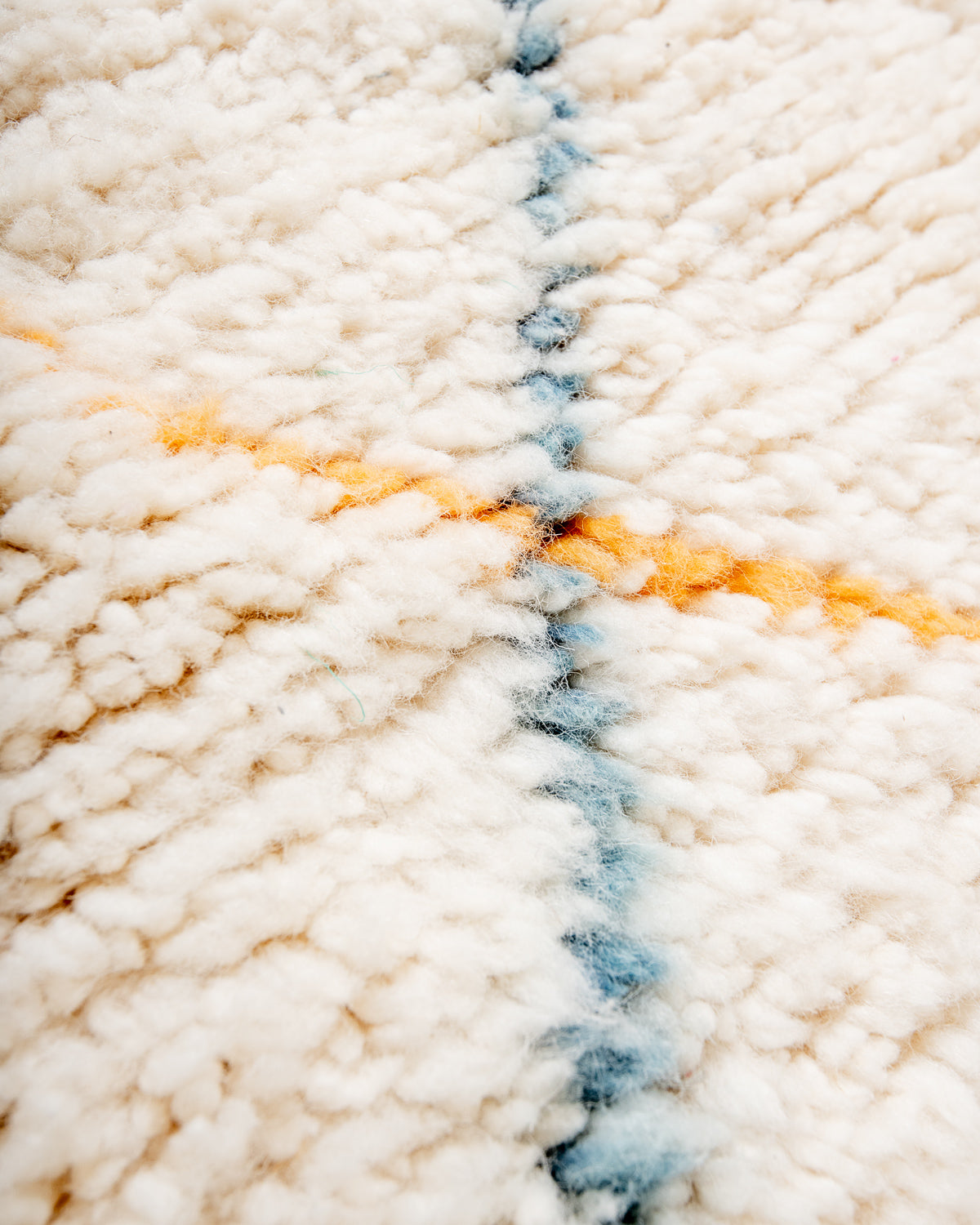 Modern, designer, handcrafted Berber rug from Morocco. Beniourain carpet with beautiful colours and patterns and fluffy wool texture.