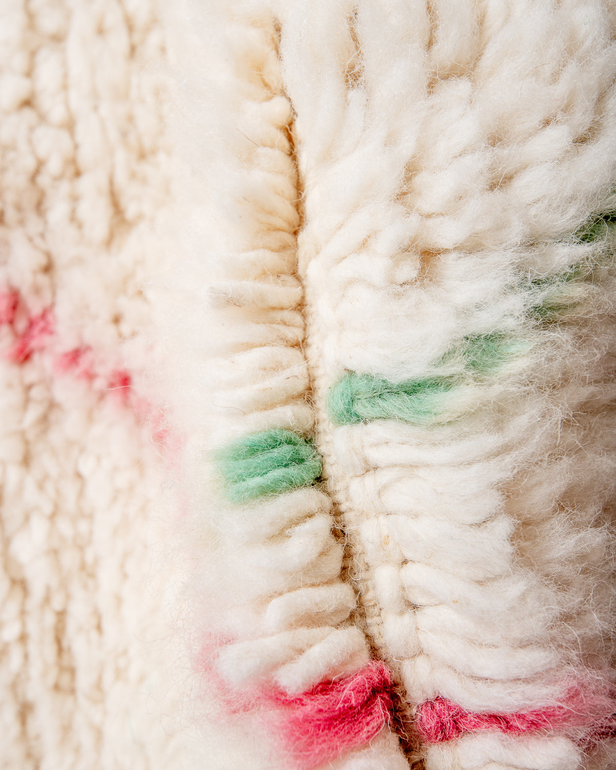 Modern, designer, handcrafted Berber rug from Morocco. Beniourain carpet with beautiful colours and patterns and fluffy wool texture.