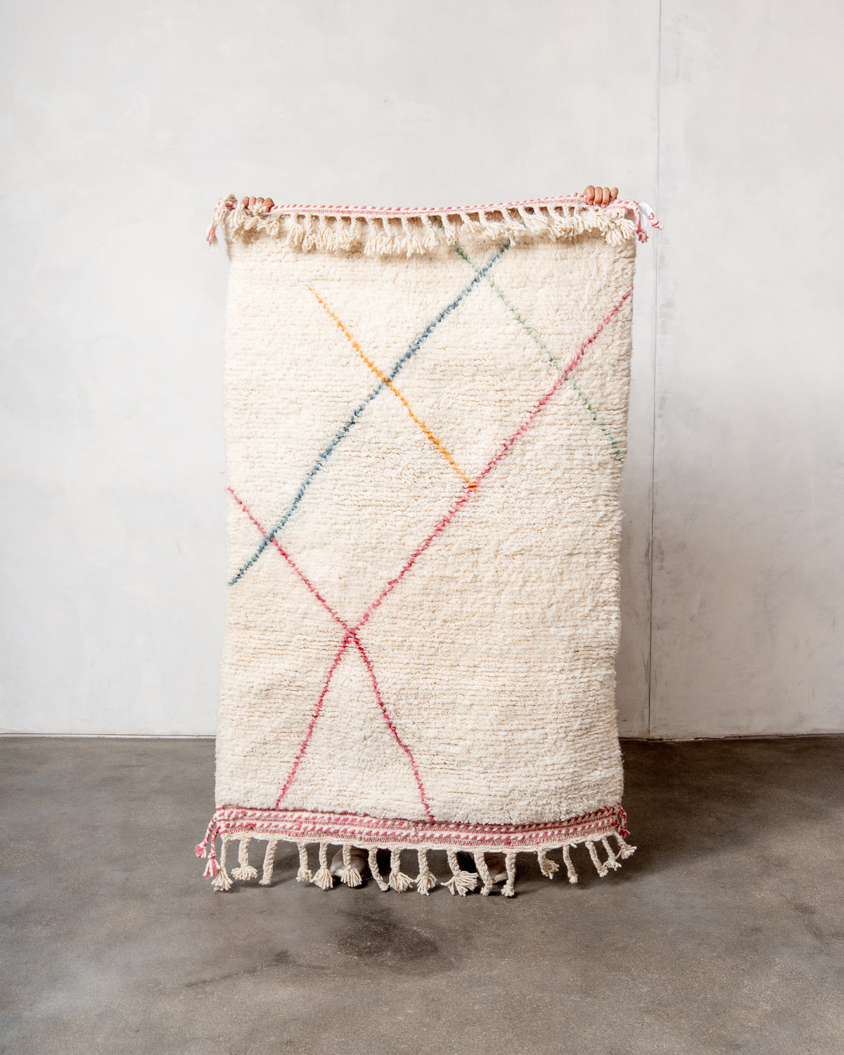 Modern, designer, handcrafted Berber rug from Morocco. Beniourain carpet with beautiful colours and patterns and fluffy wool texture.