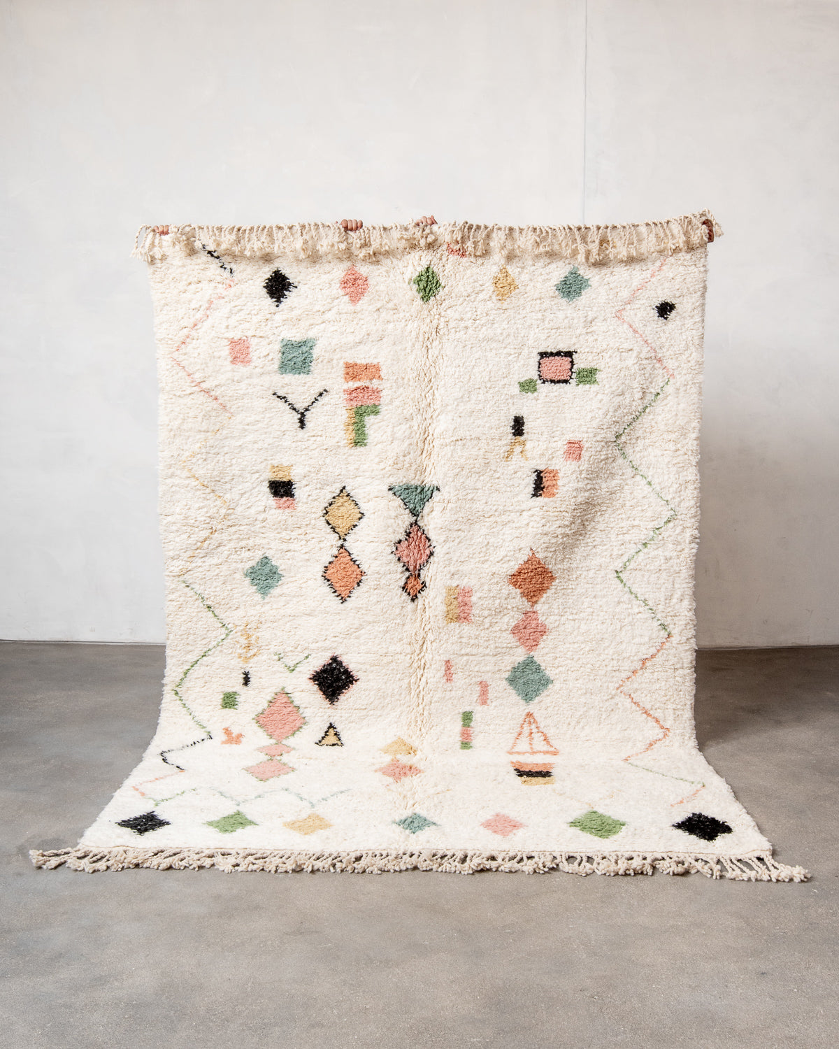 Modern, designer, handcrafted Berber runner rug from Morocco. Beniourain carpet with beautiful colours and patterns and fluffy wool texture.