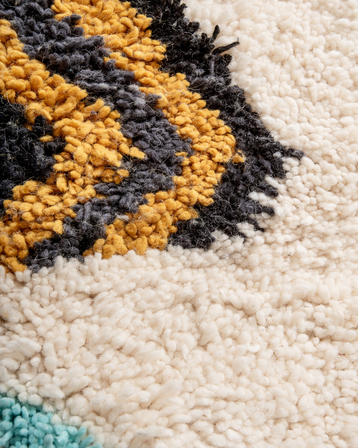 Modern, designer, handcrafted Berber runner rug from Morocco. Beniourain carpet with beautiful colours and patterns and fluffy wool texture.