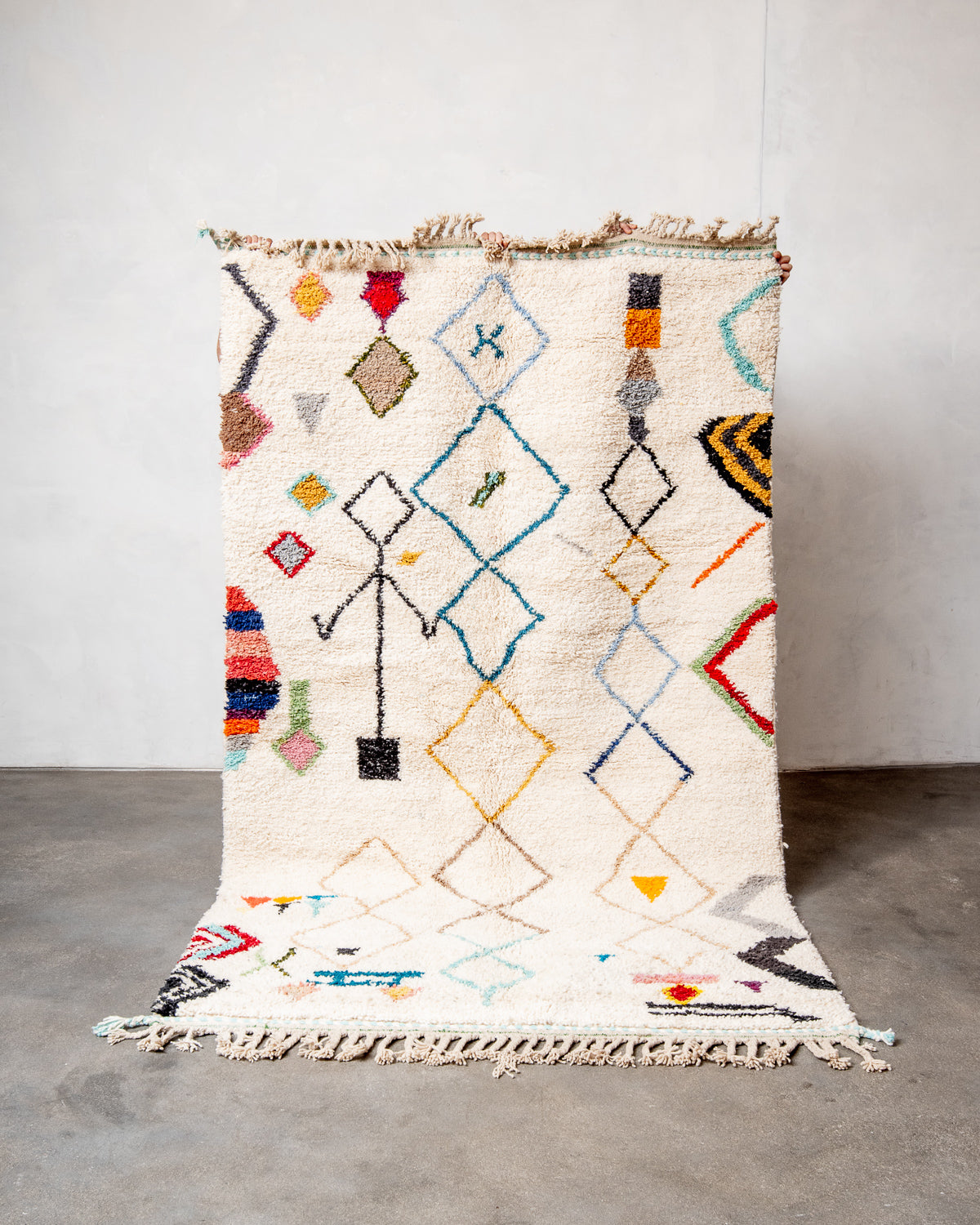 Modern, designer, handcrafted Berber runner rug from Morocco. Beniourain carpet with beautiful colours and patterns and fluffy wool texture.