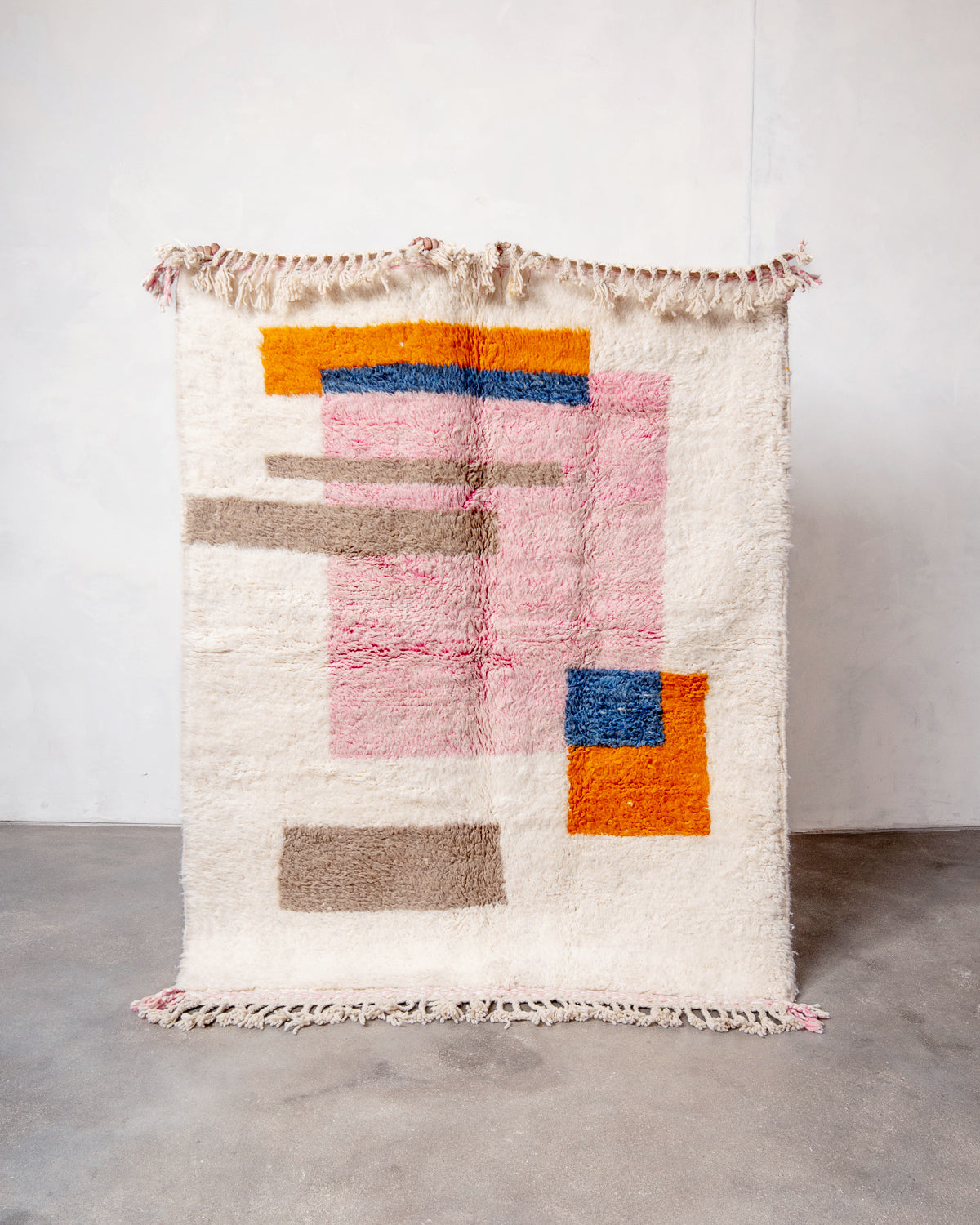 Modern, designer, handcrafted Berber runner rug from Morocco. Beniourain carpet with beautiful colours and patterns and fluffy wool texture.