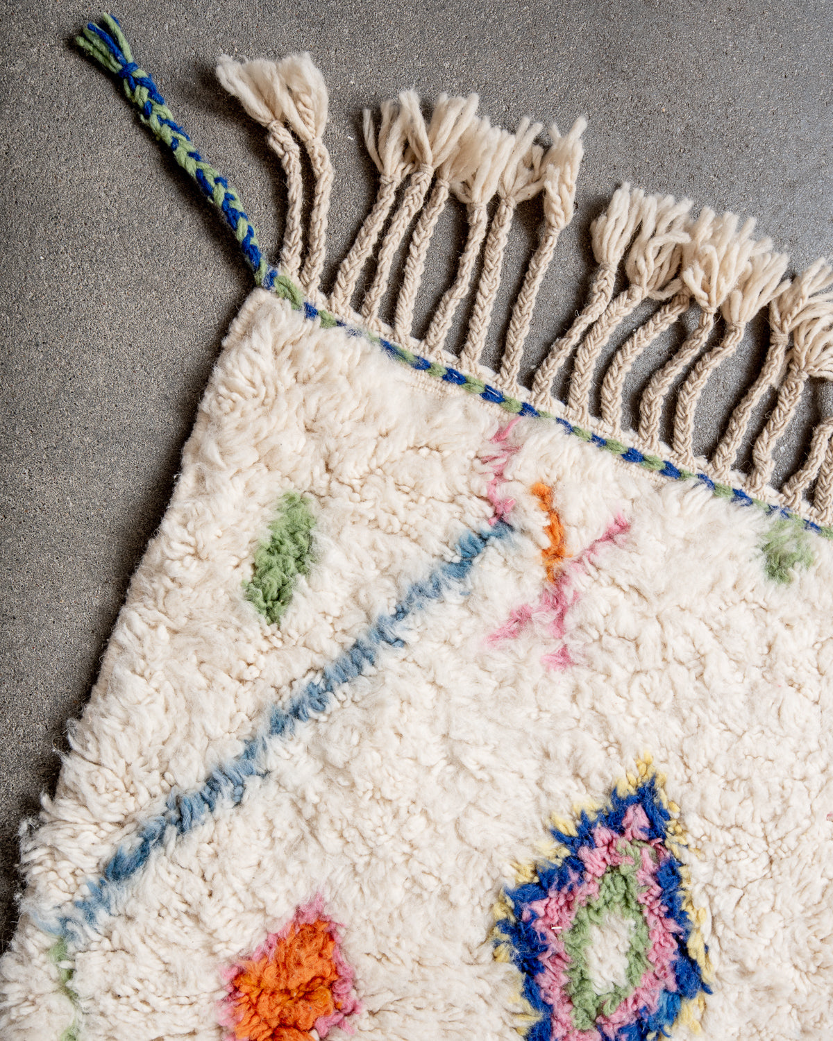 Modern, designer, handcrafted Berber runner rug from Morocco. Beniourain carpet with beautiful colours and patterns and fluffy wool texture.