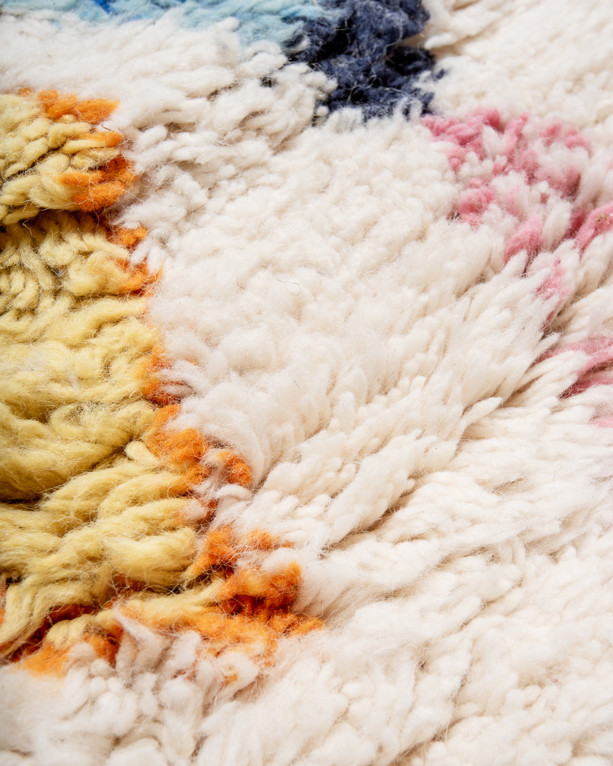 Modern, designer, handcrafted Berber runner rug from Morocco. Beniourain carpet with beautiful colours and patterns and fluffy wool texture.