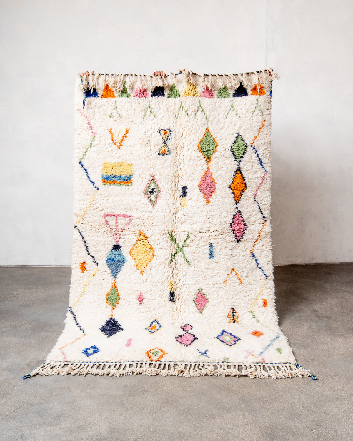 Modern, designer, handcrafted Berber runner rug from Morocco. Beniourain carpet with beautiful colours and patterns and fluffy wool texture.