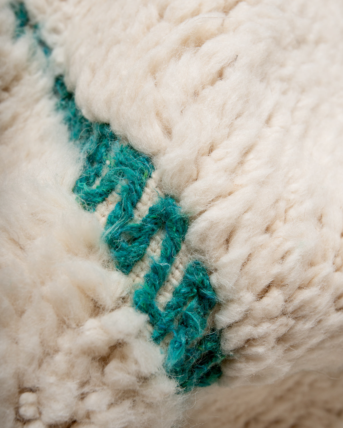 Modern, designer, handcrafted Berber runner rug from Morocco. Beniourain carpet with beautiful colours and patterns and fluffy wool texture.