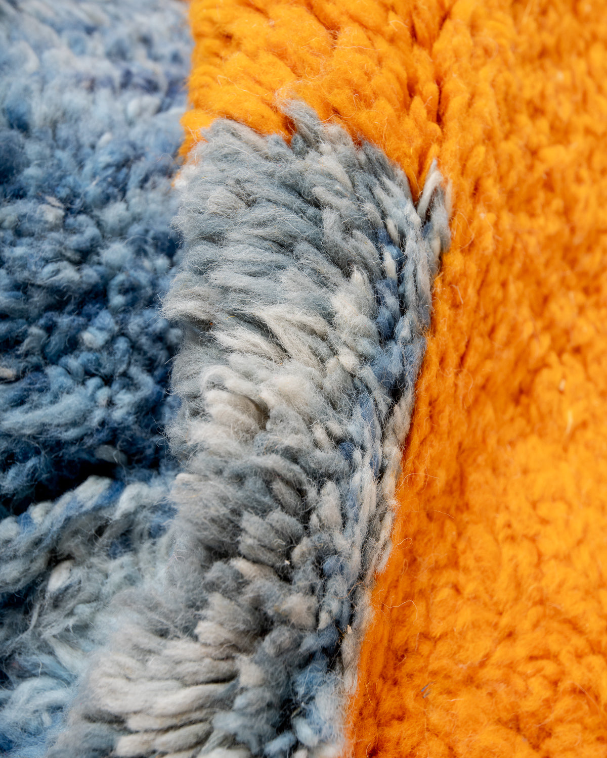 Modern, designer, handcrafted Berber runner rug from Morocco. Beniourain carpet with beautiful colours and patterns and fluffy wool texture.