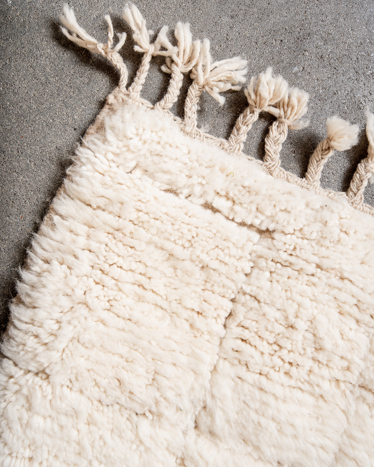 Modern, designer, handcrafted Berber rug from Morocco. Beniourain carpet with minimalist design, natural wool pile and a fluffy texture.
