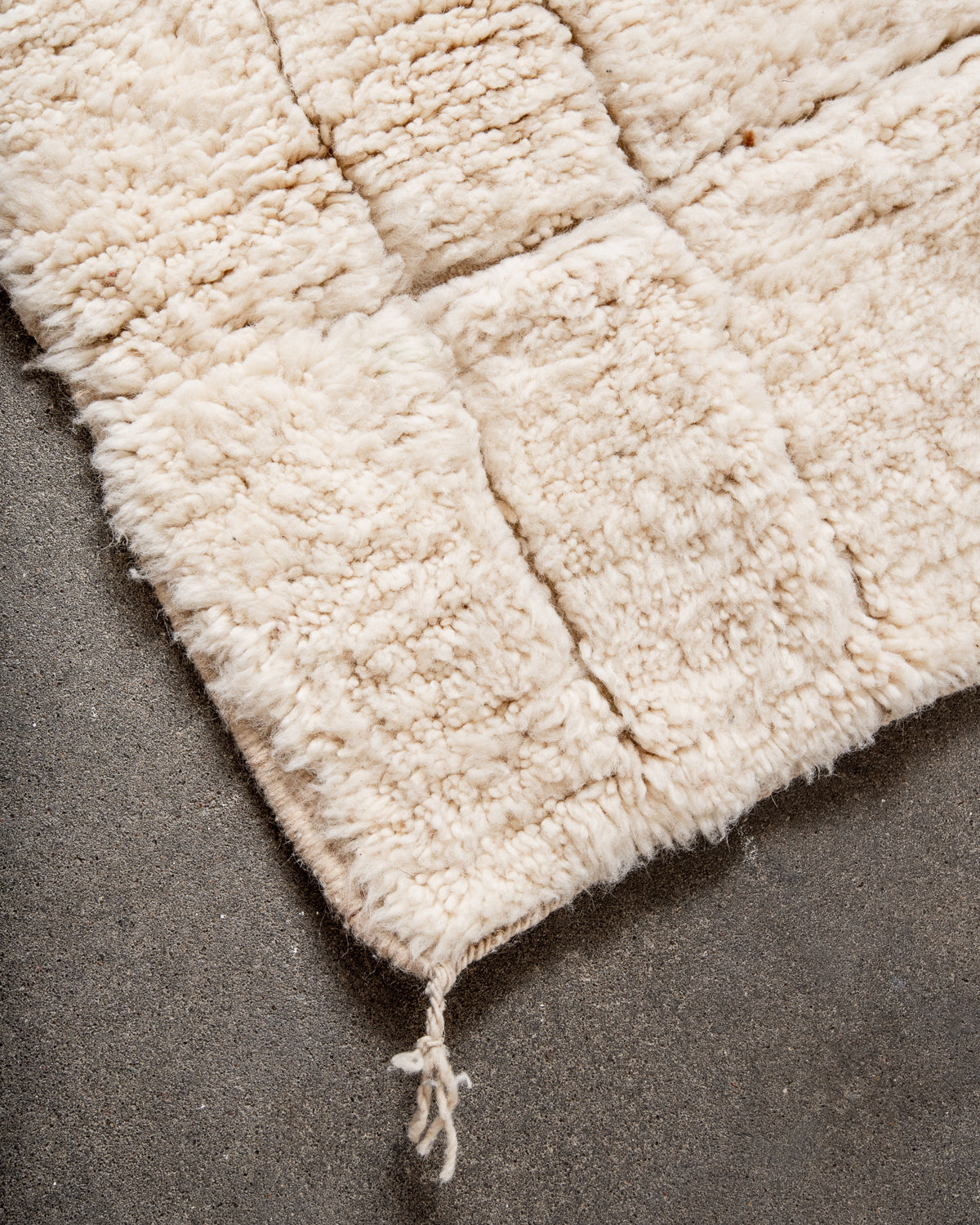 Modern, designer, handcrafted Berber rug from Morocco. Beniourain carpet with minimalist design, natural wool pile and a fluffy texture.
