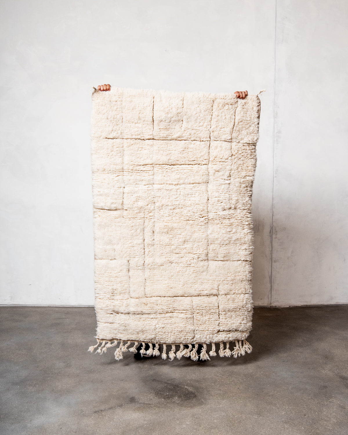 Modern, designer, handcrafted Berber rug from Morocco. Beniourain carpet with minimalist design, natural wool pile and a fluffy texture.