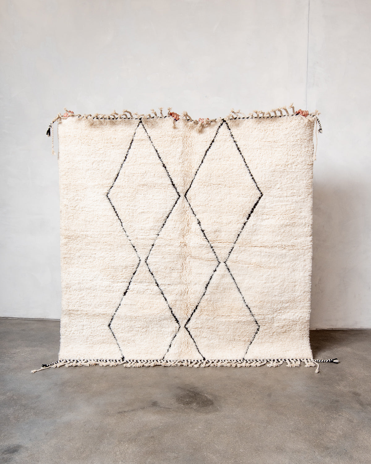 Modern, designer, handcrafted Berber rug from Morocco. Beniourain carpet with minimalist design, natural wool pile and a fluffy texture.