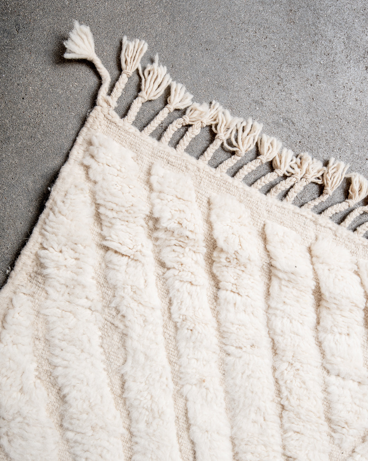 Modern, designer, handcrafted Berber rug from Morocco. Beniourain carpet with minimalist design, natural wool pile and a fluffy texture.