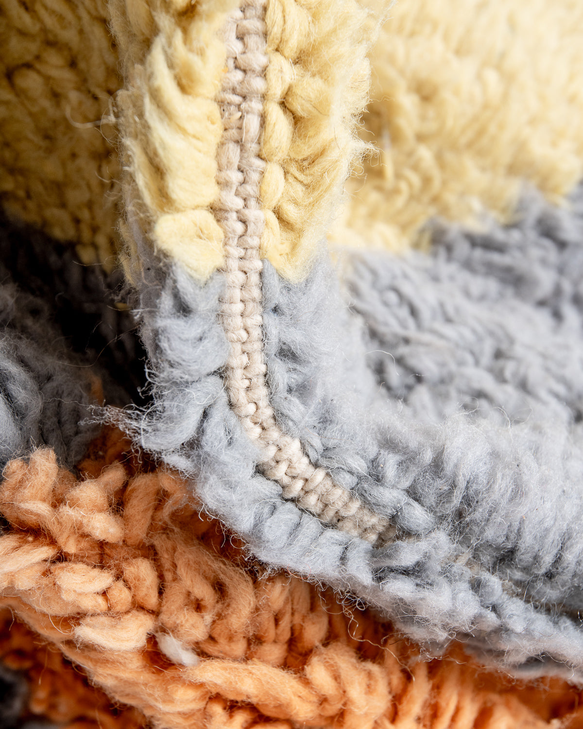 Modern, designer, handcrafted Berber rug from Morocco. Beniourain carpet with beautiful colours and patterns and fluffy wool texture.