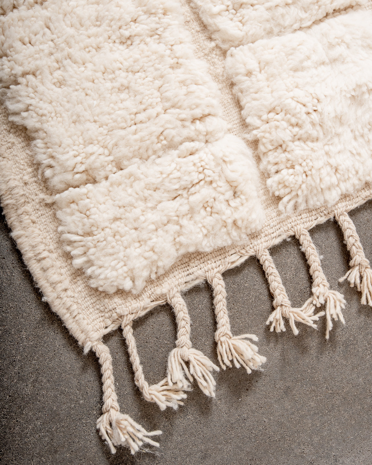 Modern, designer, handcrafted Berber rug from Morocco. Beniourain carpet with minimalist design, natural wool pile and a fluffy texture.