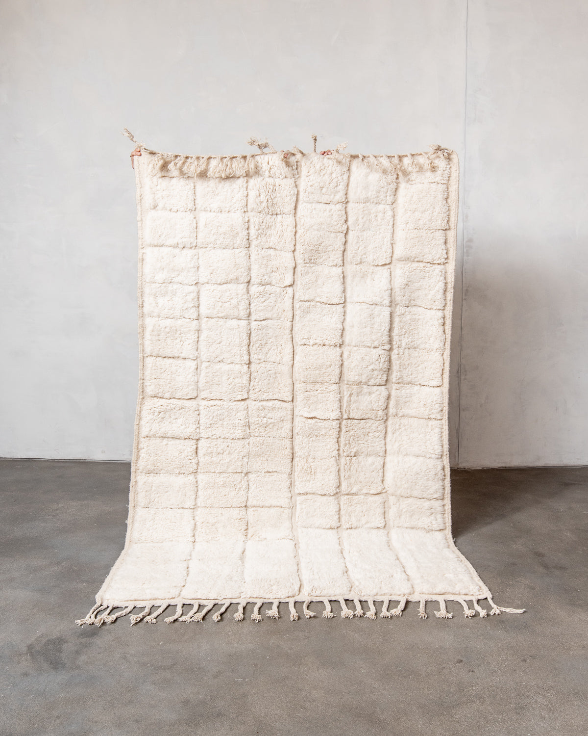 Modern, designer, handcrafted Berber rug from Morocco. Beniourain carpet with minimalist design, natural wool pile and a fluffy texture.