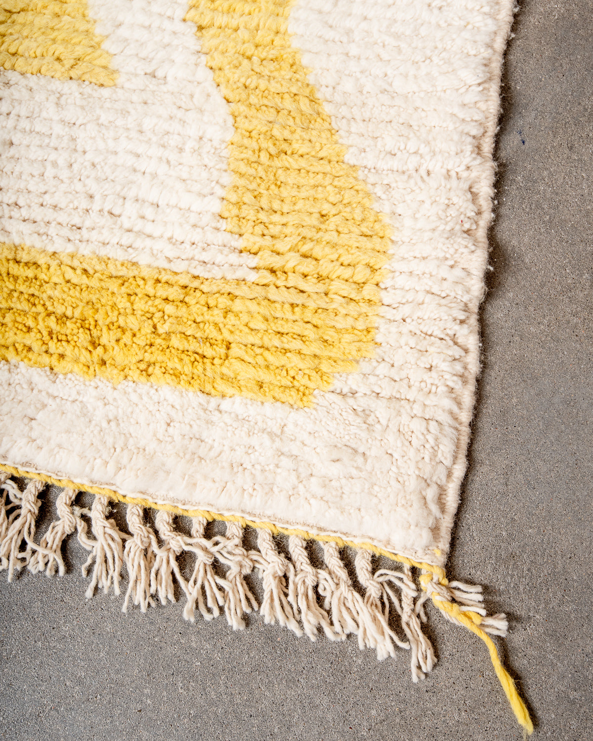Modern, designer, handcrafted Berber rug from Morocco. Beniourain carpet with beautiful colours and patterns and fluffy wool texture.
