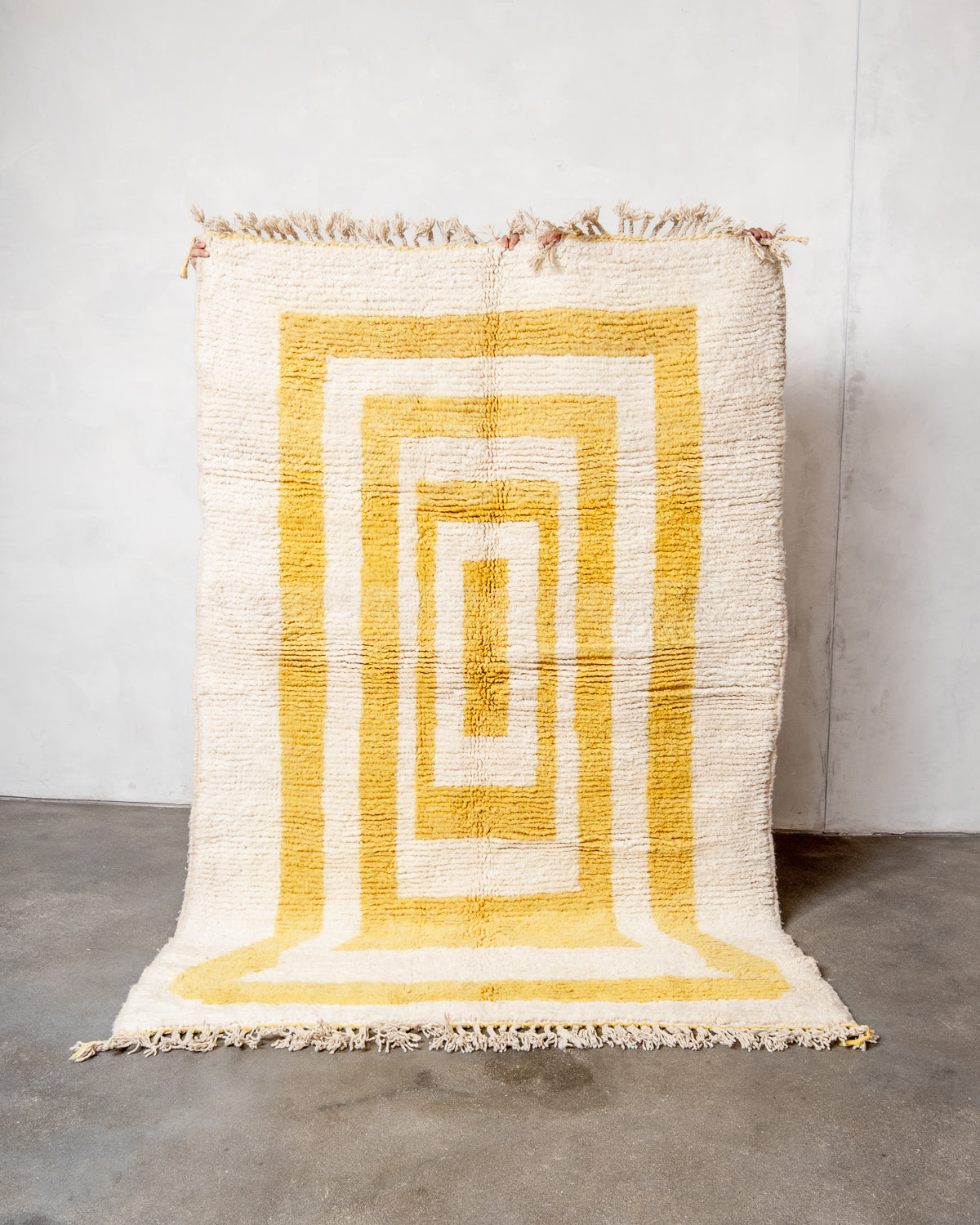 Modern, designer, handcrafted Berber rug from Morocco. Beniourain carpet with beautiful colours and patterns and fluffy wool texture.