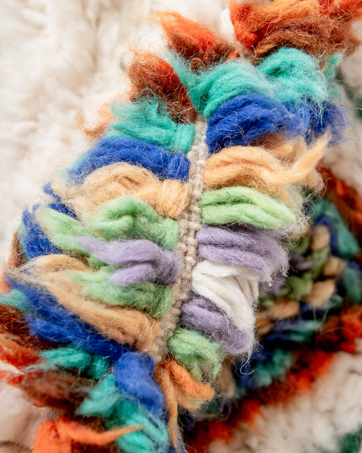 Modern, designer, handcrafted Berber rug from Morocco. Beniourain carpet with beautiful colours and patterns and fluffy wool texture.