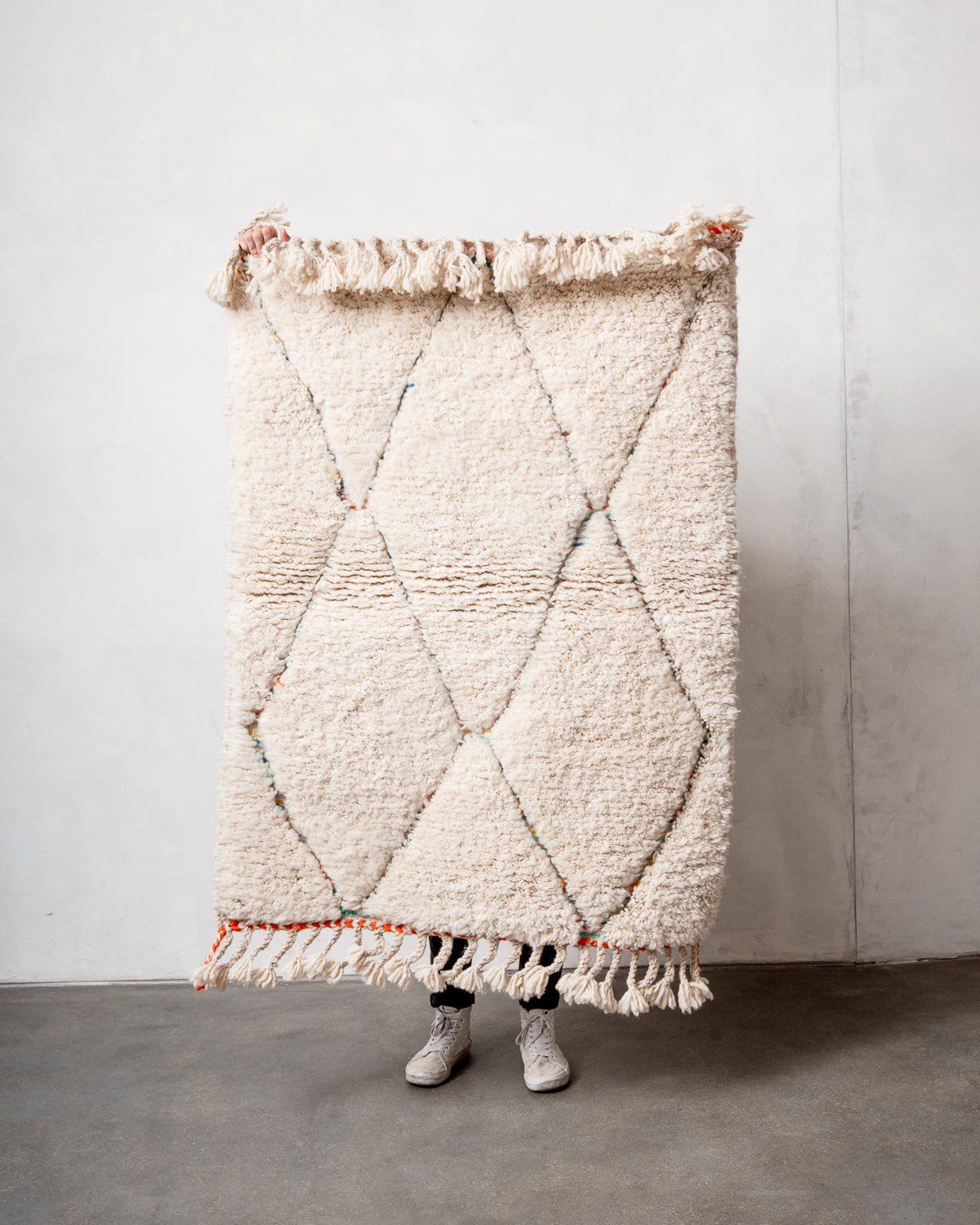 Modern, designer, handcrafted Berber rug from Morocco. Beniourain carpet with beautiful colours and patterns and fluffy wool texture.