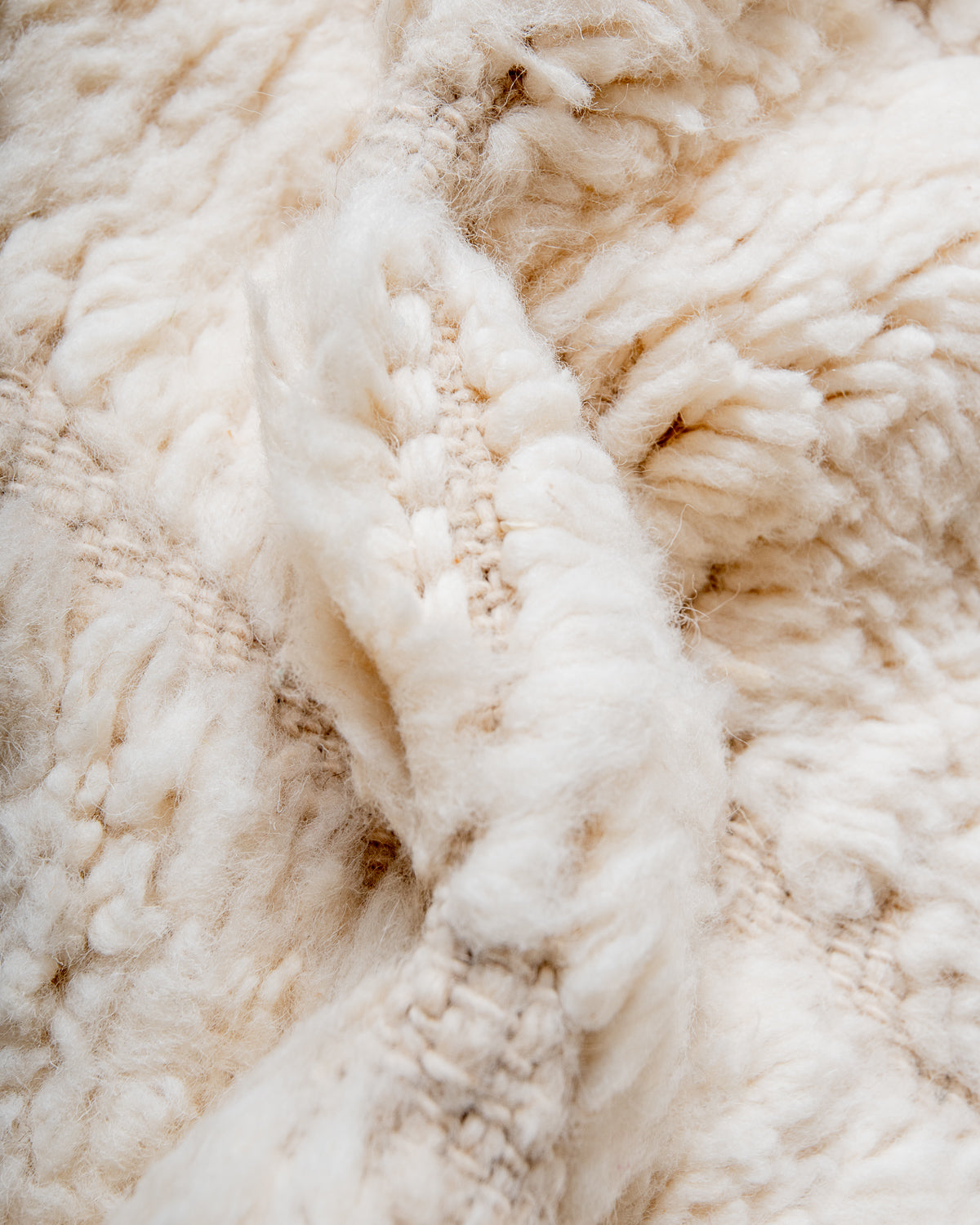 Modern, designer, handcrafted Berber rug from Morocco. Beniourain carpet with minimalist design, natural wool pile and a fluffy texture.