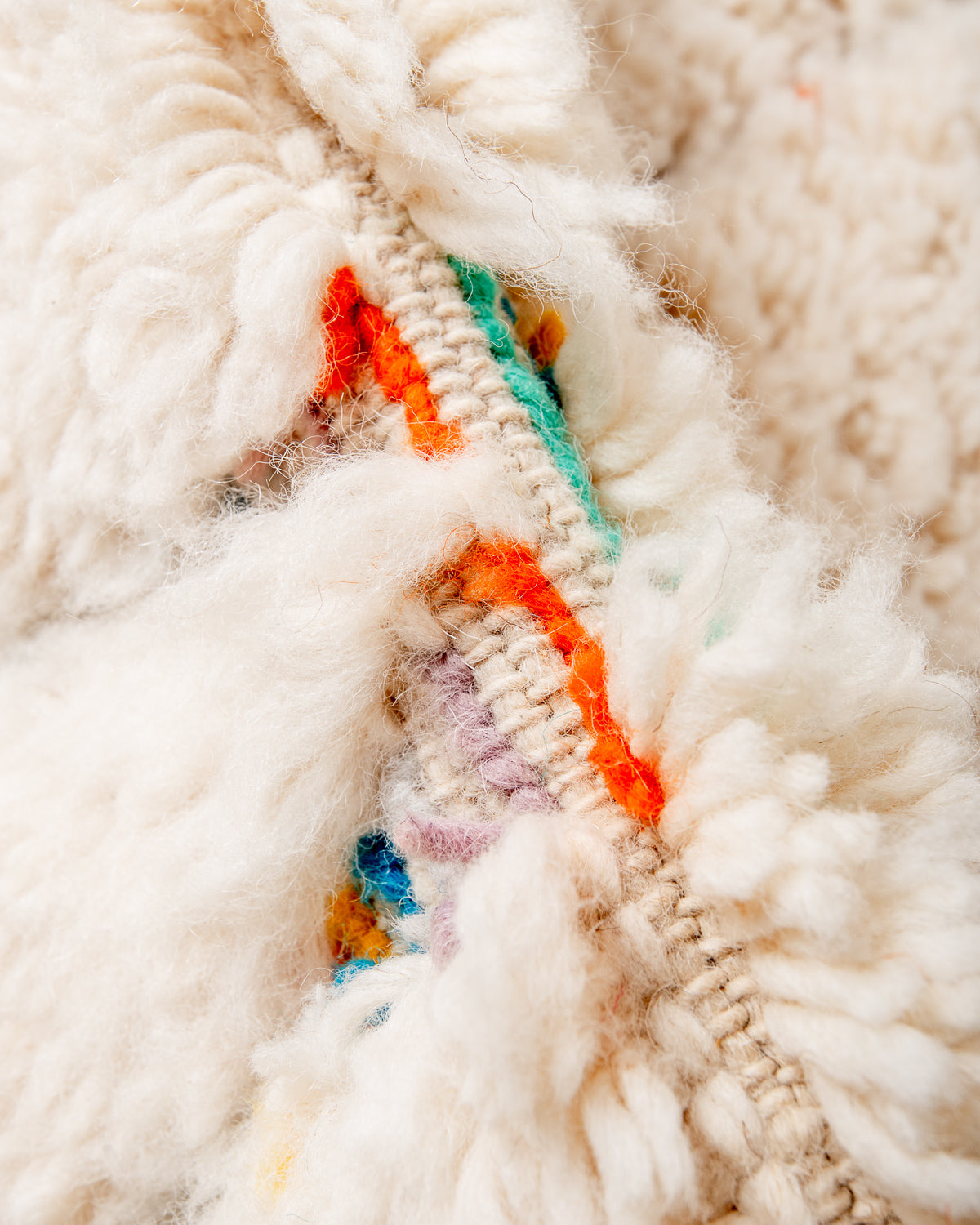 Modern, designer, handcrafted Berber rug from Morocco. Beniourain carpet with beautiful colours and patterns and fluffy wool texture.