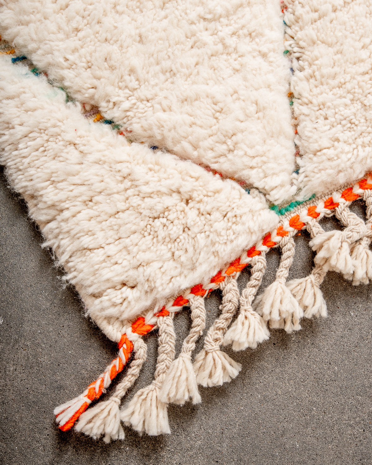 Modern, designer, handcrafted Berber rug from Morocco. Beniourain carpet with beautiful colours and patterns and fluffy wool texture.