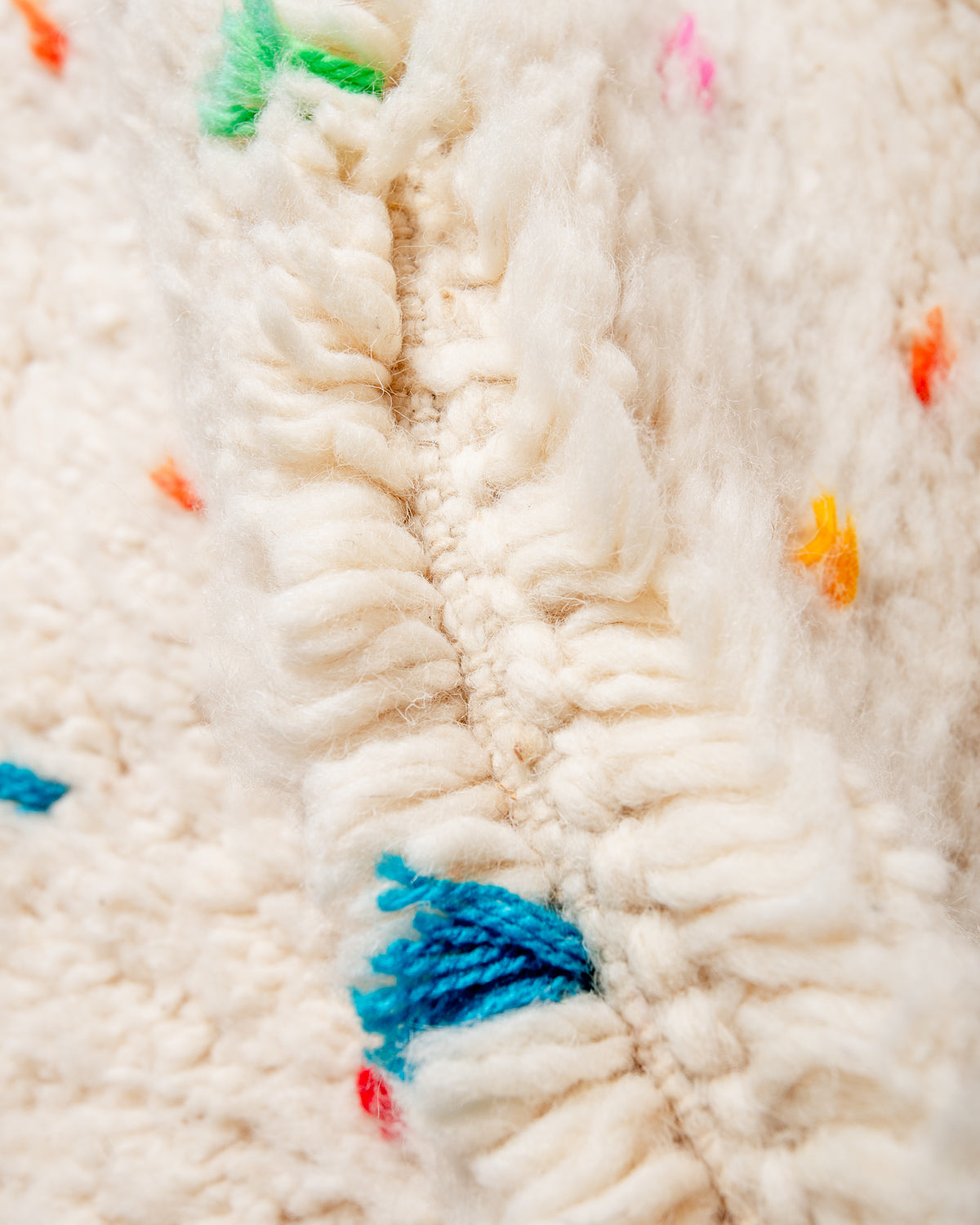 Modern, designer, handcrafted Berber rug from Morocco. Beniourain carpet with beautiful colours and patterns and fluffy wool texture.