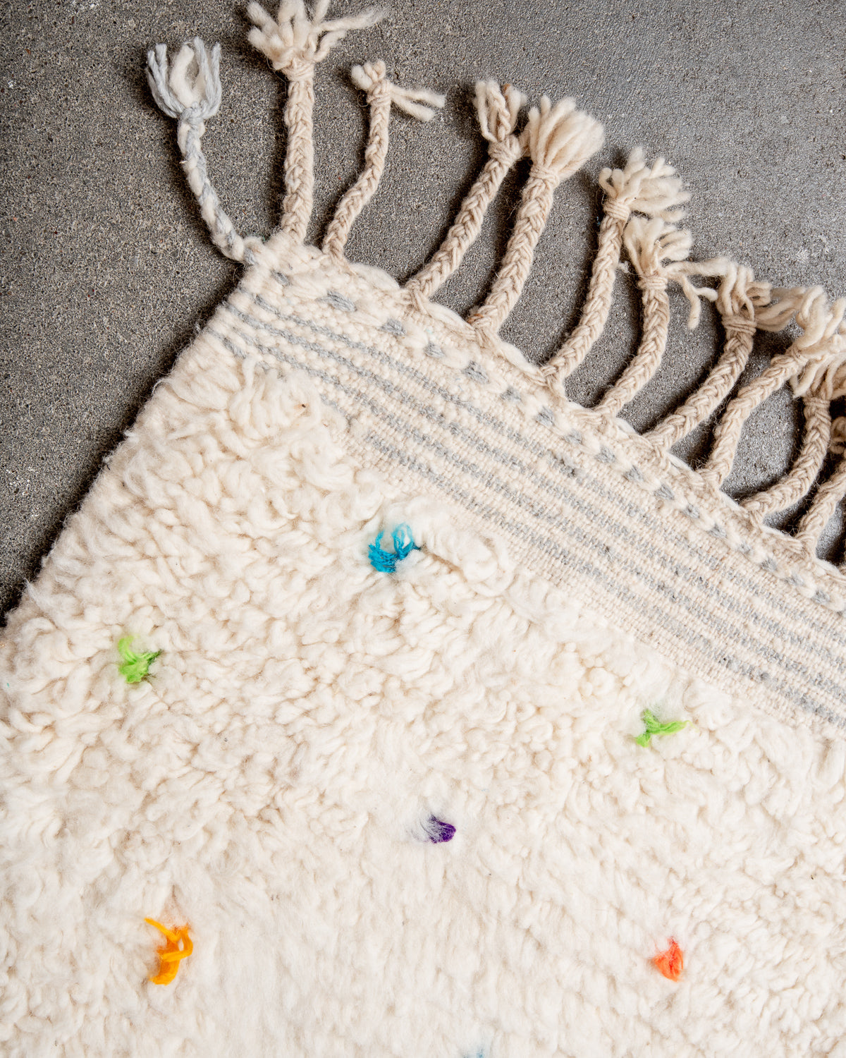 Modern, designer, handcrafted Berber rug from Morocco. Beniourain carpet with beautiful colours and patterns and fluffy wool texture.