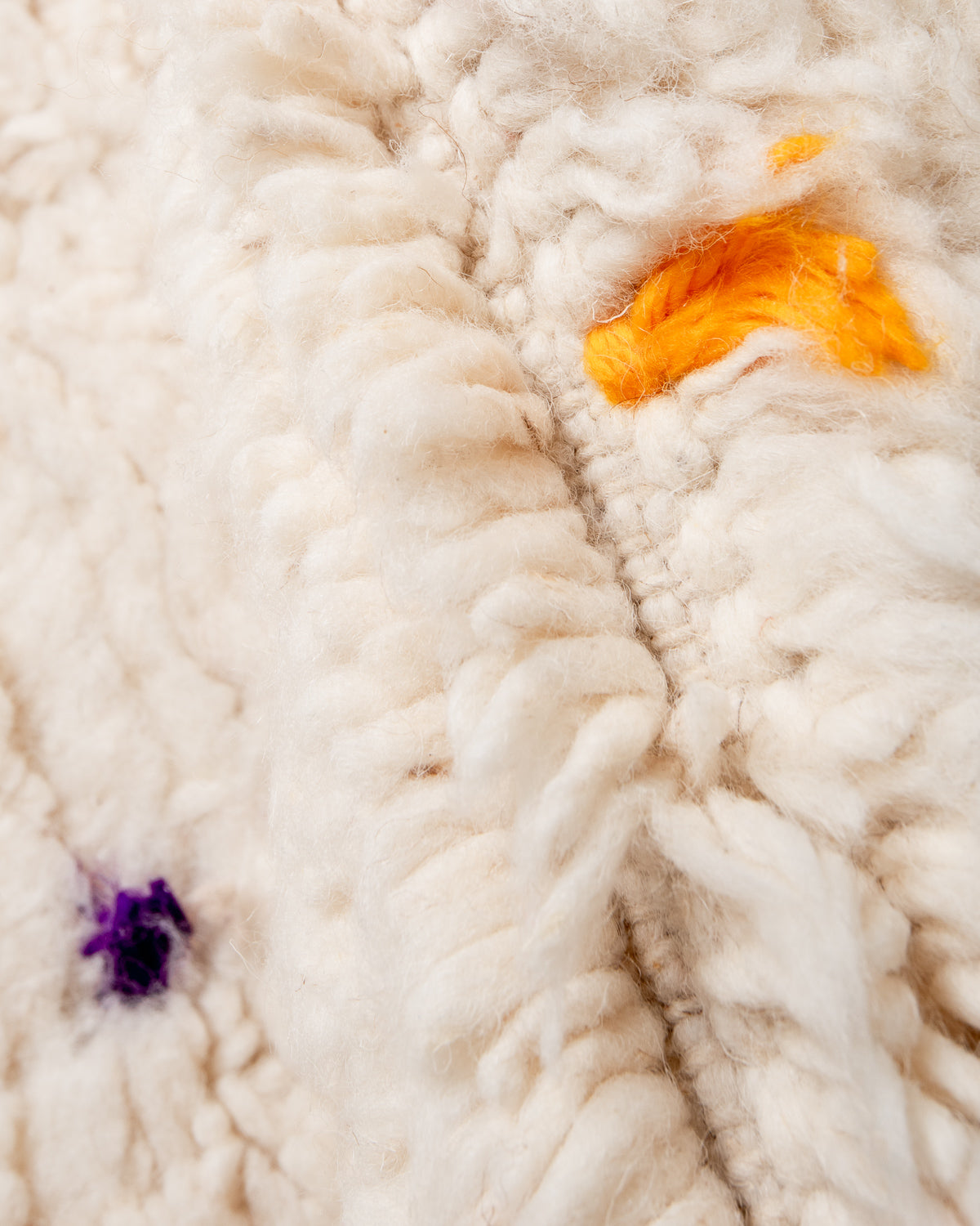 Modern, designer, handcrafted Berber rug from Morocco. Beniourain carpet with beautiful colours and patterns and fluffy wool texture.