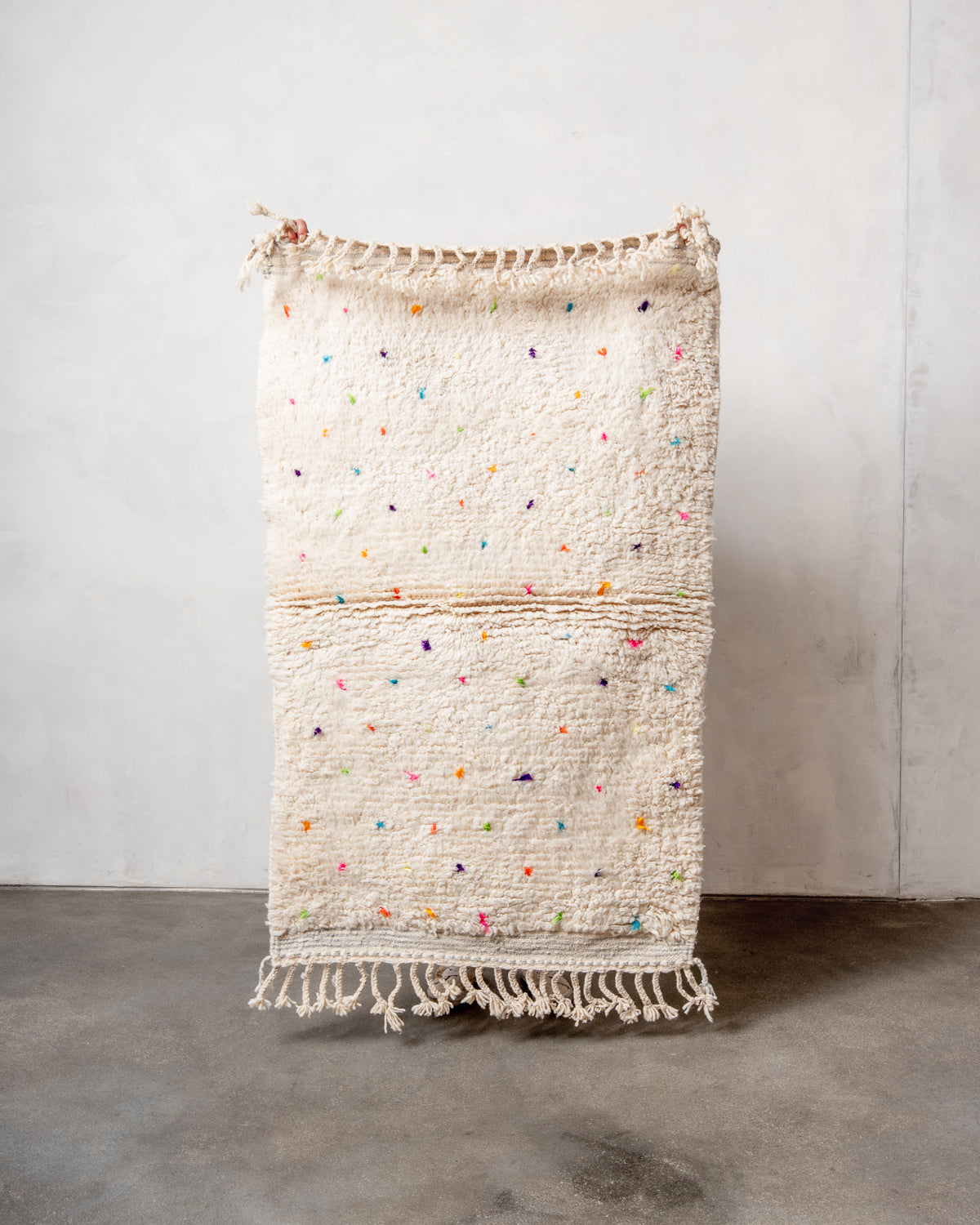 Modern, designer, handcrafted Berber rug from Morocco. Beniourain carpet with beautiful colours and patterns and fluffy wool texture.