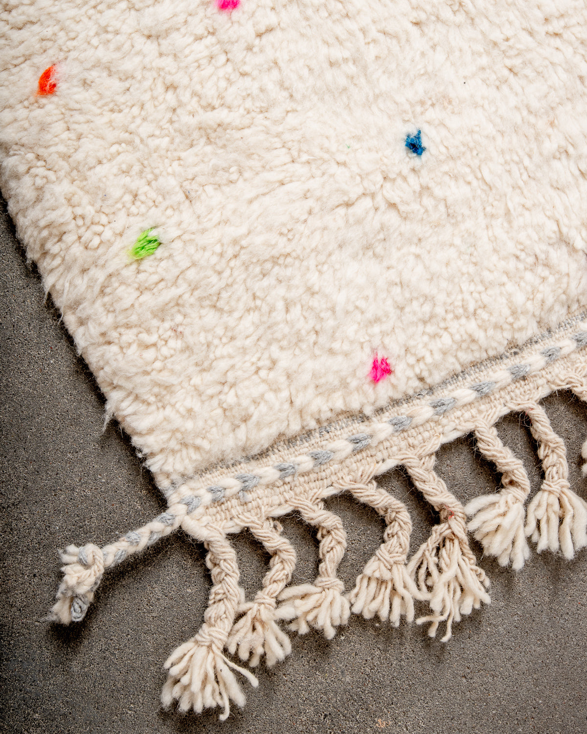 Modern, designer, handcrafted Berber rug from Morocco. Beniourain carpet with beautiful colours and patterns and fluffy wool texture.