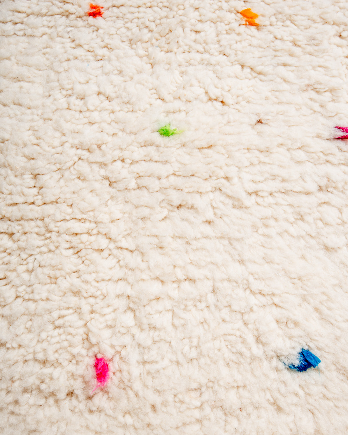 Modern, designer, handcrafted Berber rug from Morocco. Beniourain carpet with beautiful colours and patterns and fluffy wool texture.