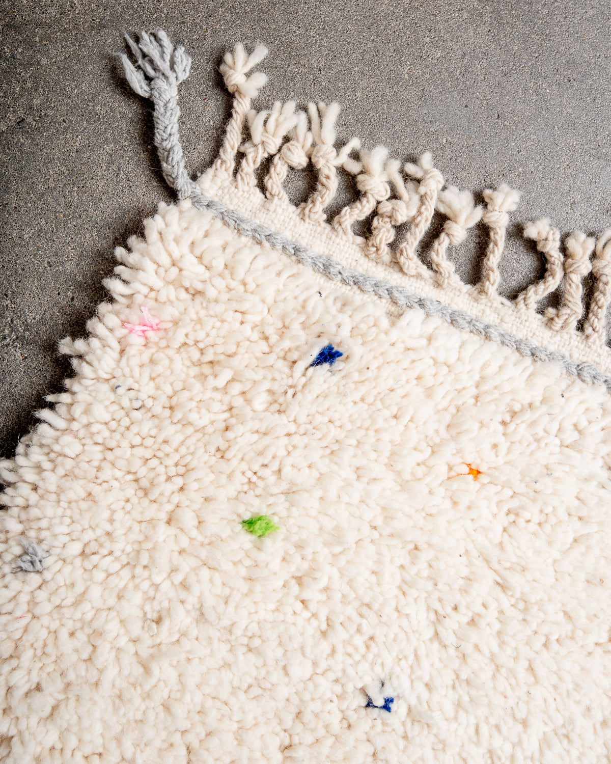 Modern, designer, handcrafted Berber rug from Morocco. Beniourain carpet with beautiful colours and patterns and fluffy wool texture.