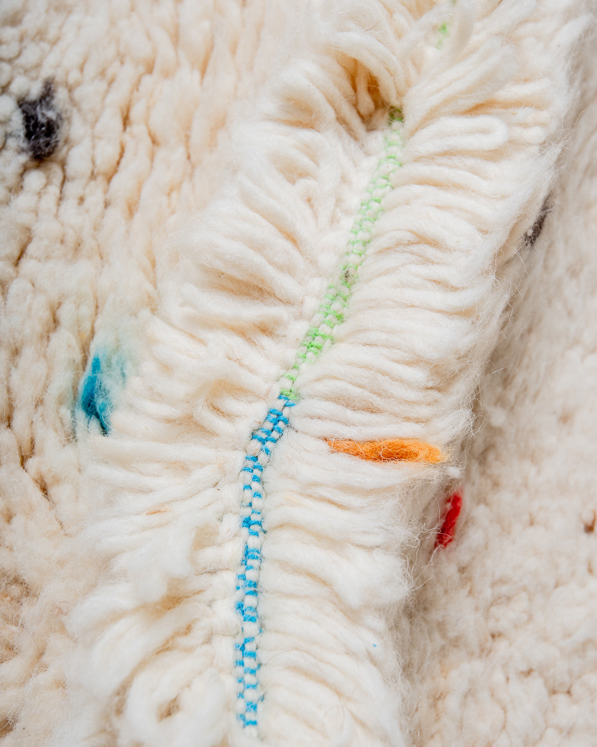 Modern, designer, handcrafted Berber rug from Morocco. Beniourain carpet with beautiful colours and patterns and fluffy wool texture.