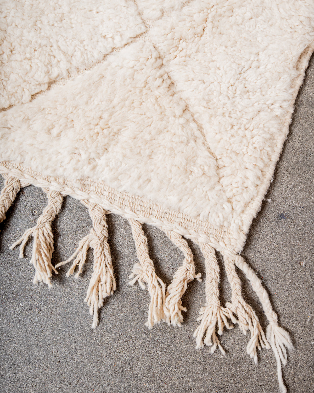 Modern, designer, handcrafted Berber rug from Morocco. Beniourain carpet with minimalist design, natural wool pile and a fluffy texture.
